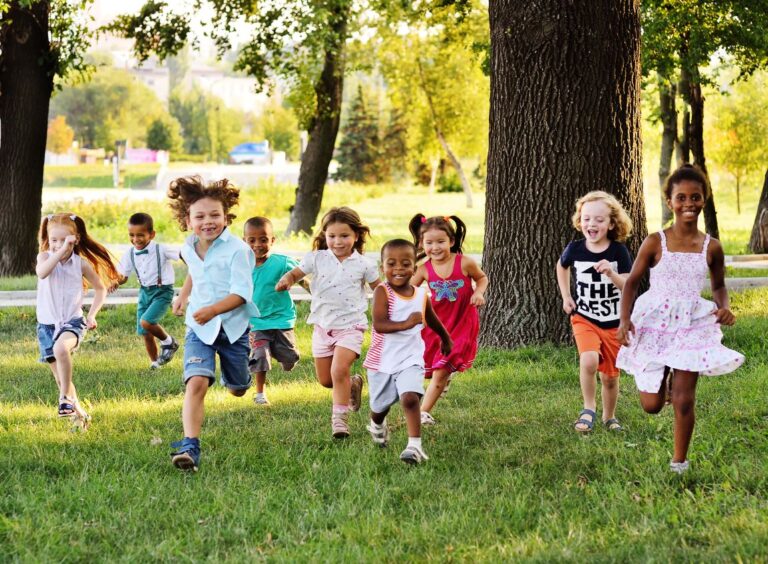 group of happy children running